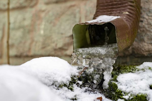 An Ice Dam Forming In A Water Pipe During A Texas Winter Storm.